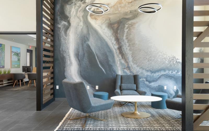 a room with a large painting