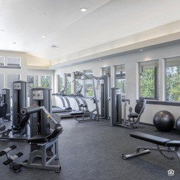 fitness center with exercise equipment