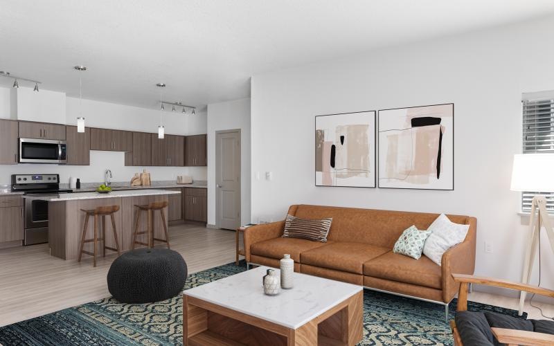 a living room with a couch and a table