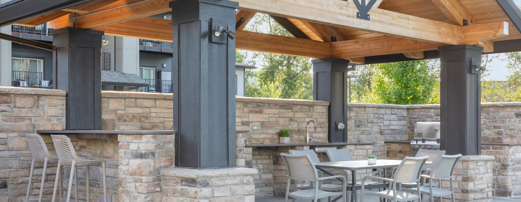 a patio with a table and chairs