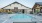 a swimming pool outside a house