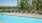 a pool with chairs around it